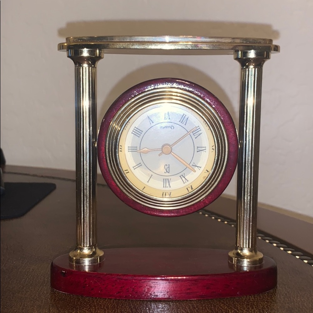 Paul Sebastian quartz gold rotating face clock